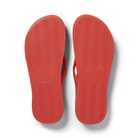 Archies Arch Support Thongs in coral pictured upside down from the bottom